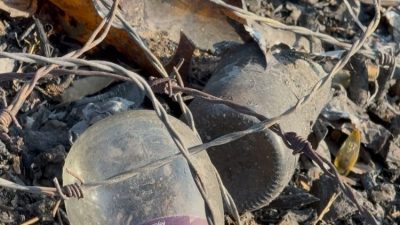 Gümüşsuyu Mahallesi'nde yangın çıkan alanda cam şişelerin temizlendiğine dair basın