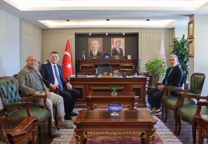 Fenerbahçe'nin eski teknik direktörü Aykut Kocaman ve iş insanı Seyfettin